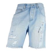 Lysblå Denim Bermuda Shorts med Tårer og Slid