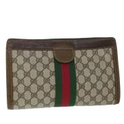 Pre-owned Canvas clutches