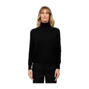 Fladstrikket rullekrave sweater