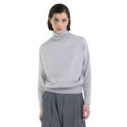 Oversized turtleneck sweater med ribbedetaljer